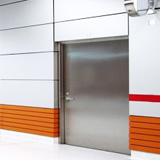 Specialty Steel Doors: A Primer on Acoustic, Tornado, Stainless Steel and More Specialty Steel Doors: A Primer on Acoustic, Tornado, Stainless Steel and More